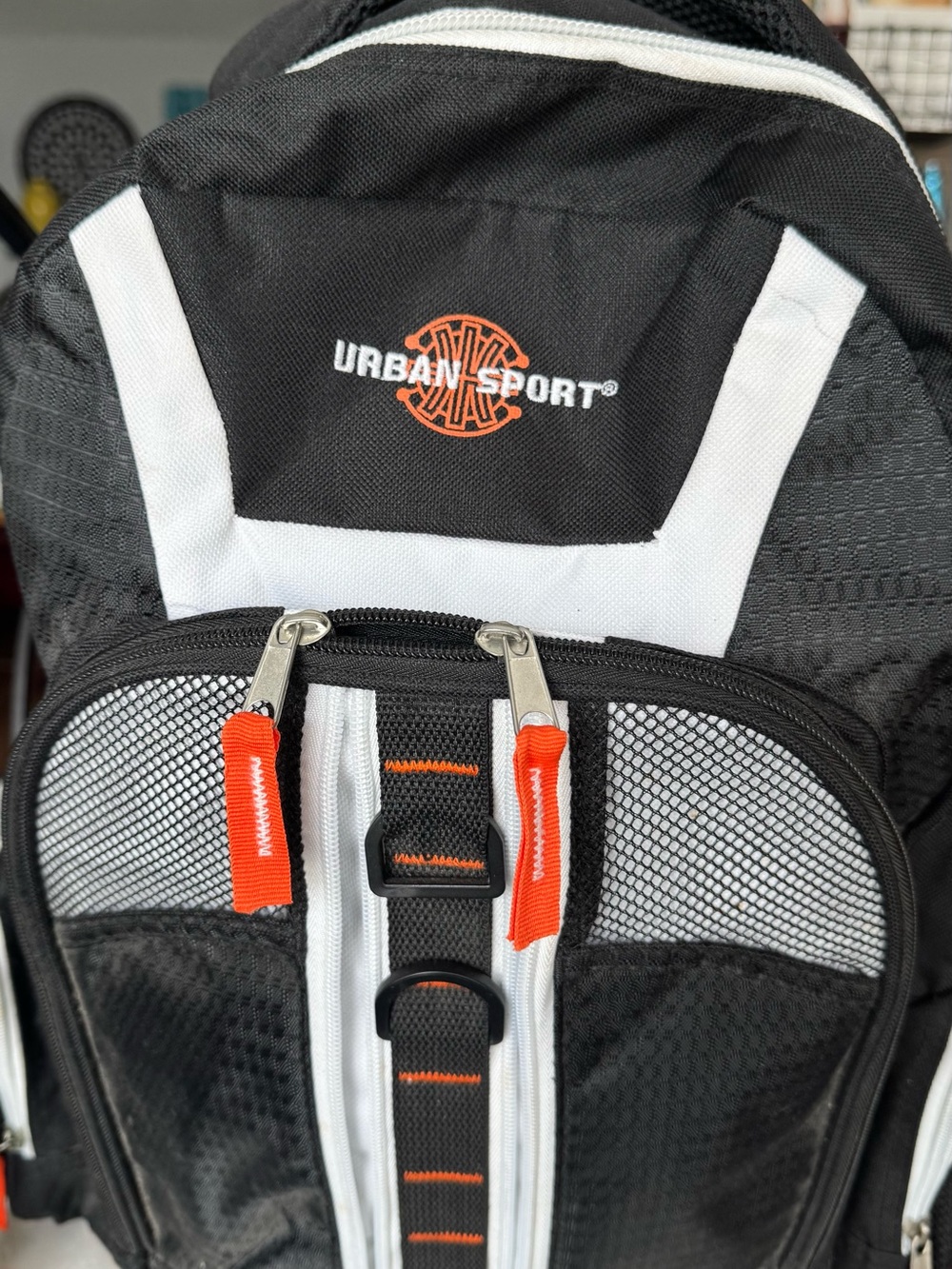 Black & White Backpack with Orange Accents